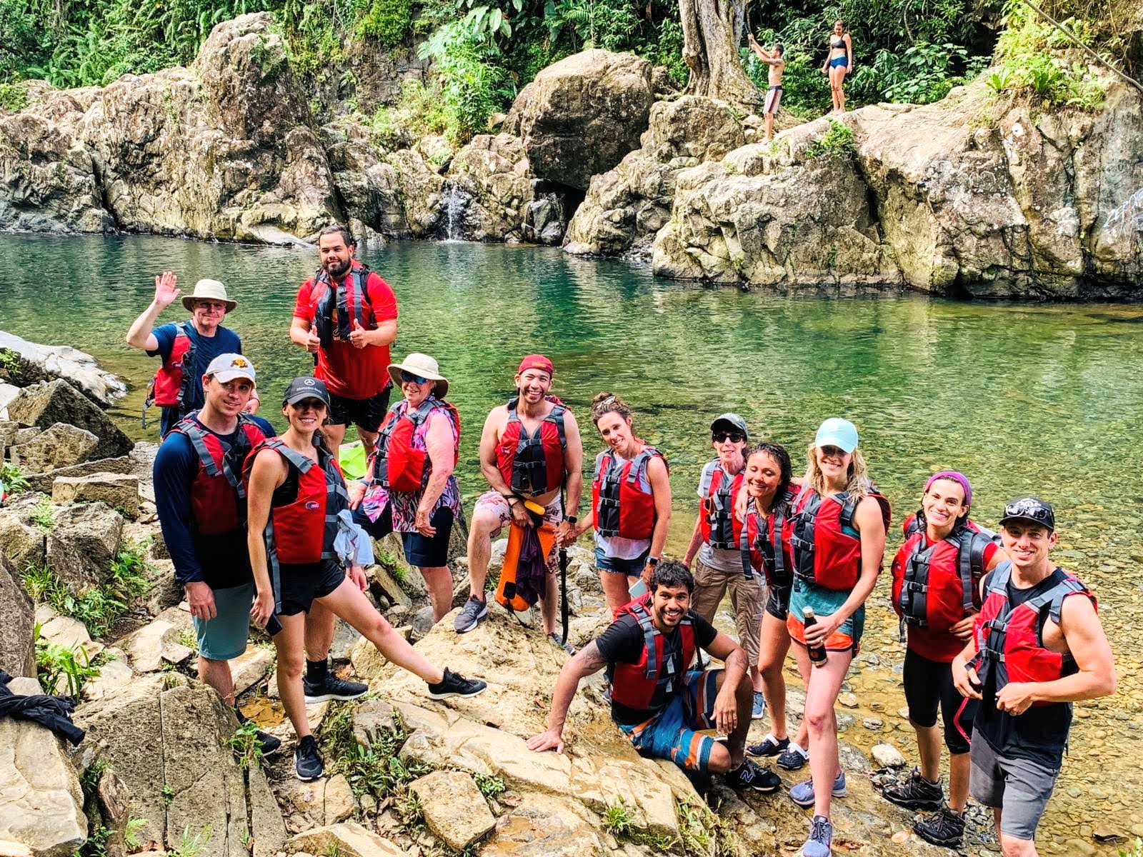group posing by lagoon